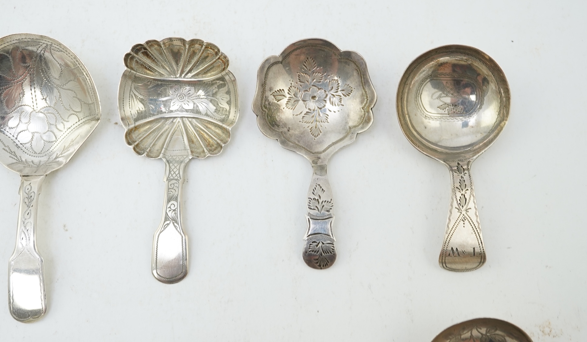 Ten assorted manly 19th century silver caddy spoons